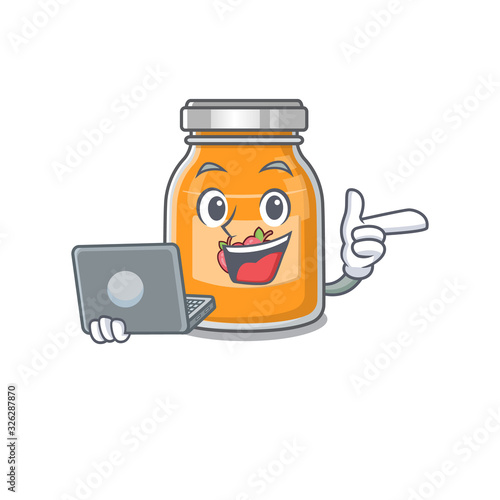 Cool character of apple jam working with laptop