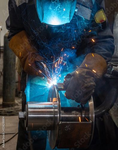 welding works at a Metalworking company, welder