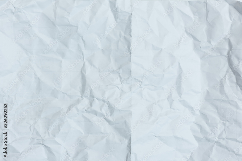 Obraz premium White crumpled paper texture background.