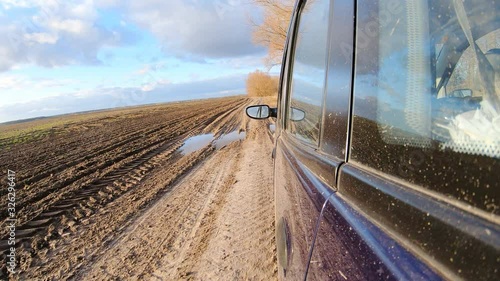 The vehicle traveling on the road, slow motion on the camera action.