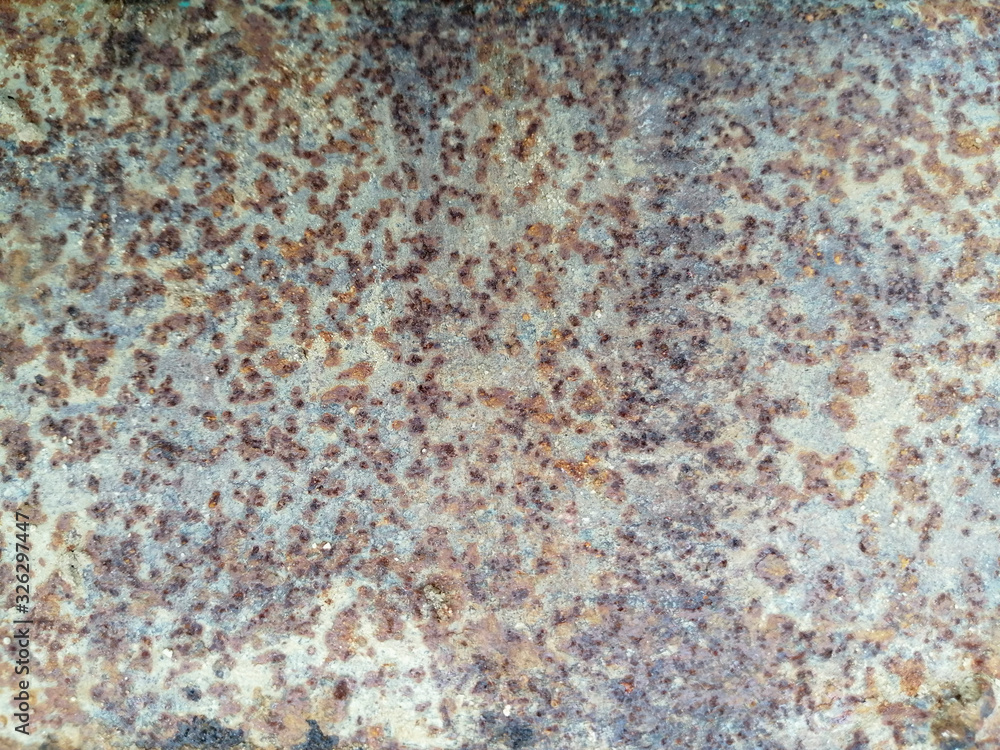 Fototapeta premium red rusty iron on metal plates. Background