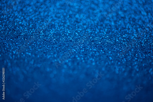 Glitter blue Background Merry Christmas Background. Soft selective focus.