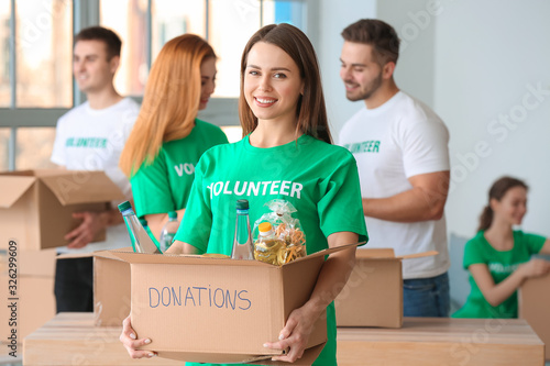 Team of volunteers with pro...