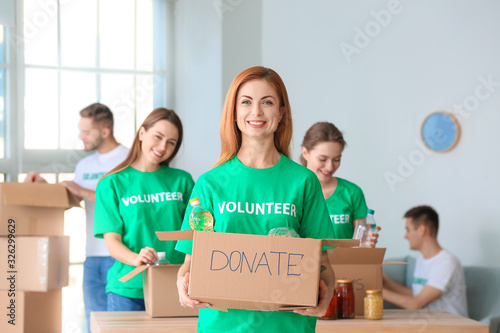 Team of volunteers with pro...