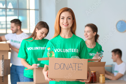 Team of volunteers with pro...