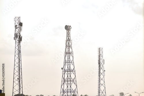 Telecommunication tower of mobile phones or cellular, Telecommunication tower with antennas against sky