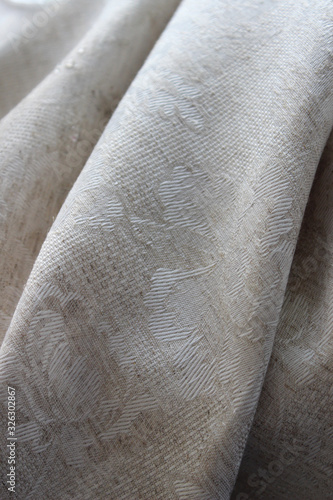 Tan from natural raw materials, patterned fabric, linen