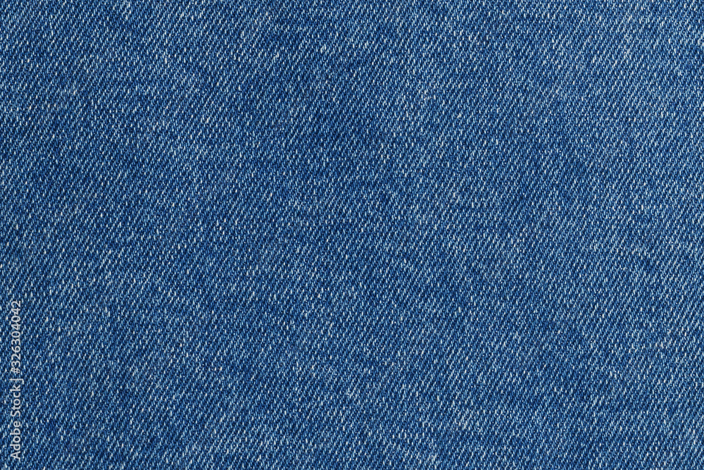 Top view on blue denim. Abstract modern trendy fabric texture background Top view on blue denim. Abstract modern trendy fabric texture background