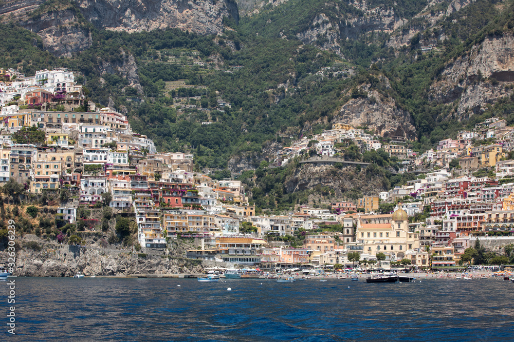 Small town of Positano along Amalfi coast with its many wonderful colors and terraced houses, Campania, Italy.