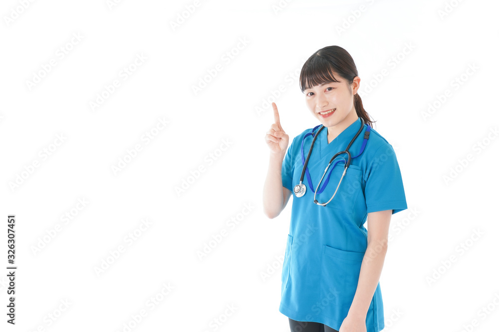 指を指す若い女性看護師 指を指す若い女性看護師