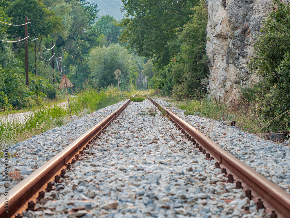 Fototapeta premium train track rails line at evening close up