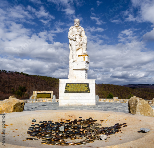 Money donations at Vulchan Voivoda Memorial Bulgarian monument photo