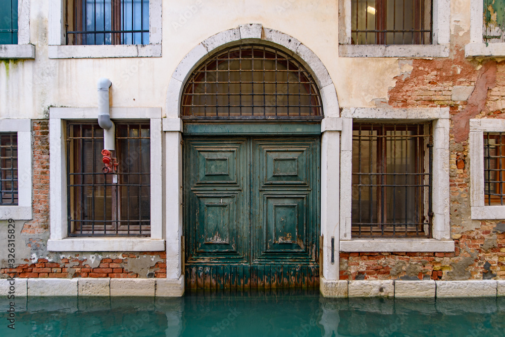 Vintage buildings along the canal in Venice, Italy