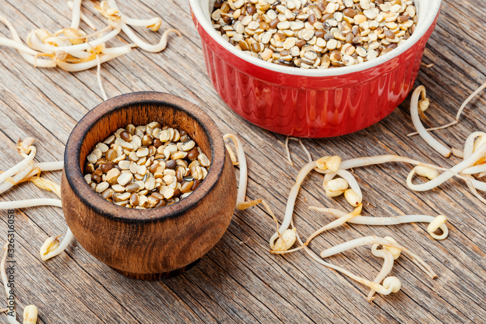 Mung beans on wooden table Mung beans on wooden table