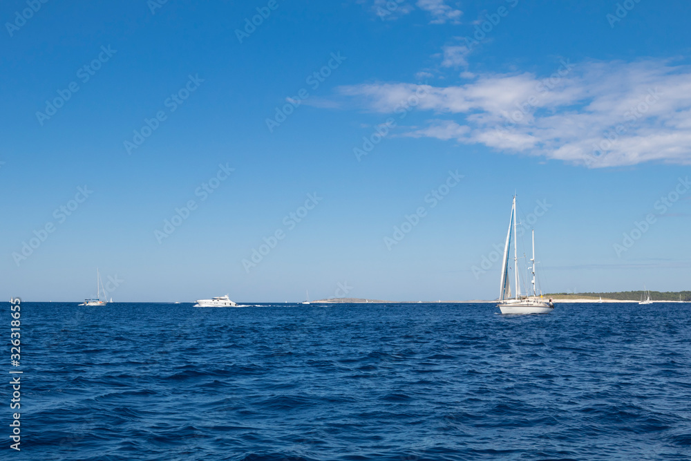 Obraz premium luxury big white sailing yachts at the sea 