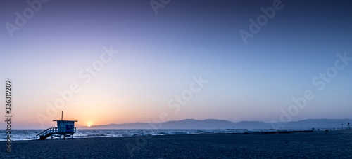 Sunset on the beach in California, Coast Guard rescue shed