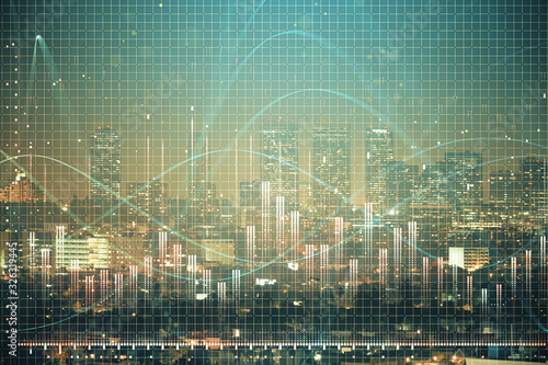 Financial graph on night city scape with tall buildings background multi exposure. Analysis concept.