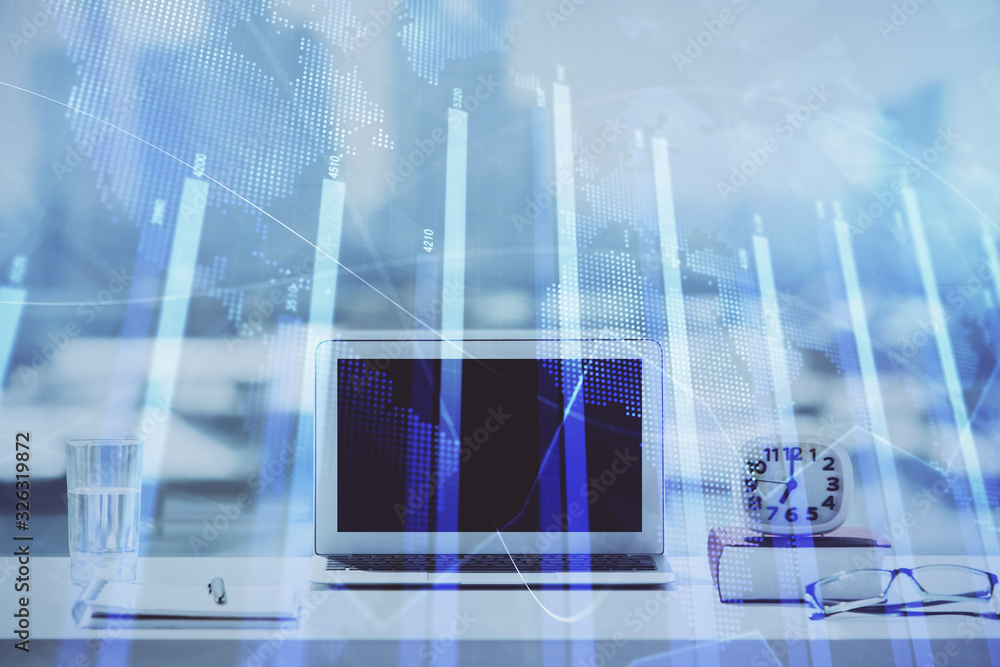 Forex graph hologram on table with computer background. Multi exposure. Concept of financial markets. Forex graph hologram on table with computer background. Multi exposure. Concept of financial markets.