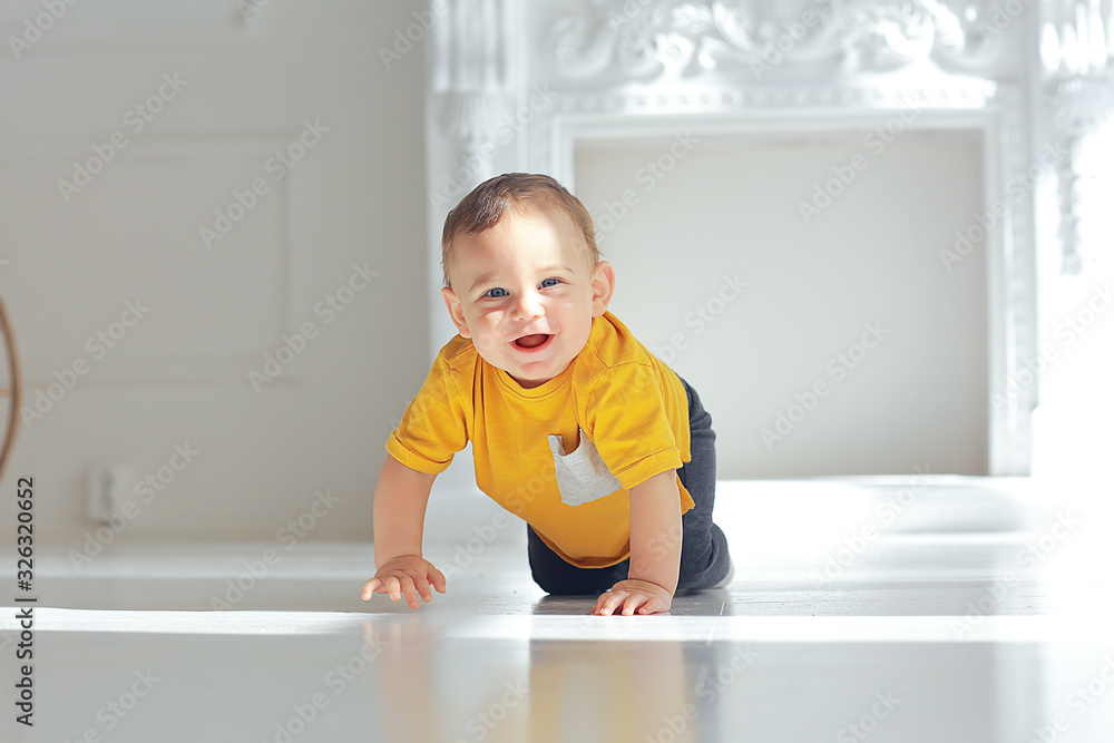 cheerful healthy baby smiling / portrait of a small child, boy little son cheerful health