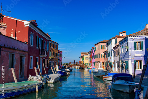 Burano island, famous for its colorful fishermen's houses, in Venice, Italy © momo11353
