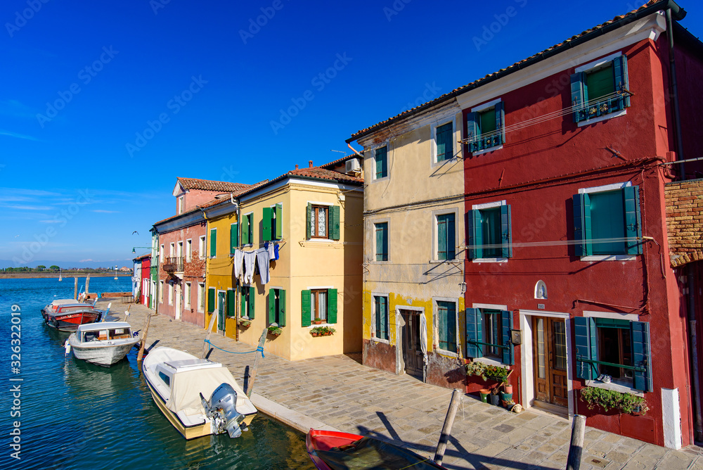 Burano island, famous for its colorful fishermen's houses, in Venice, Italy