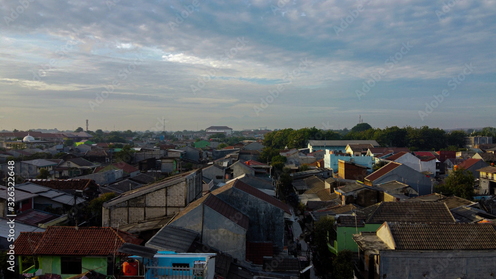 Fototapeta premium Aerial POV view Depiction of flooding. devastation wrought after massive natural disasters at Bekasi - Indonesia