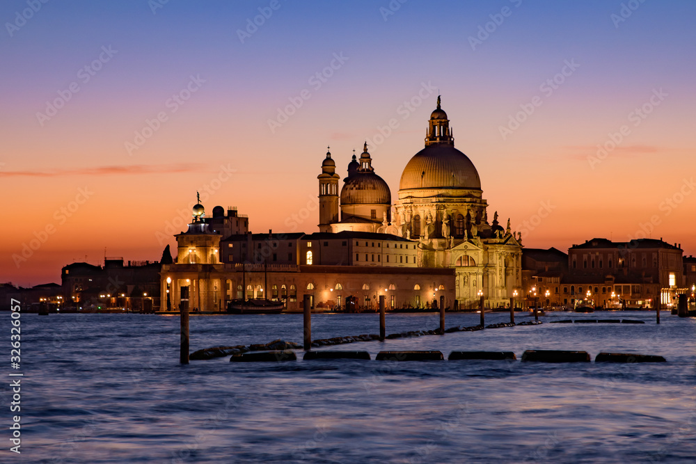 Santa Maria della Salute (Saint Mary of Health) at sunset time, a Catholic church in Venice, Italy