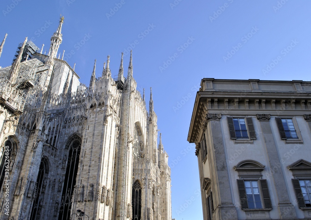 Old medieval Italian city Milan urban architecture cityscape cathedral Duomo building history elements background 