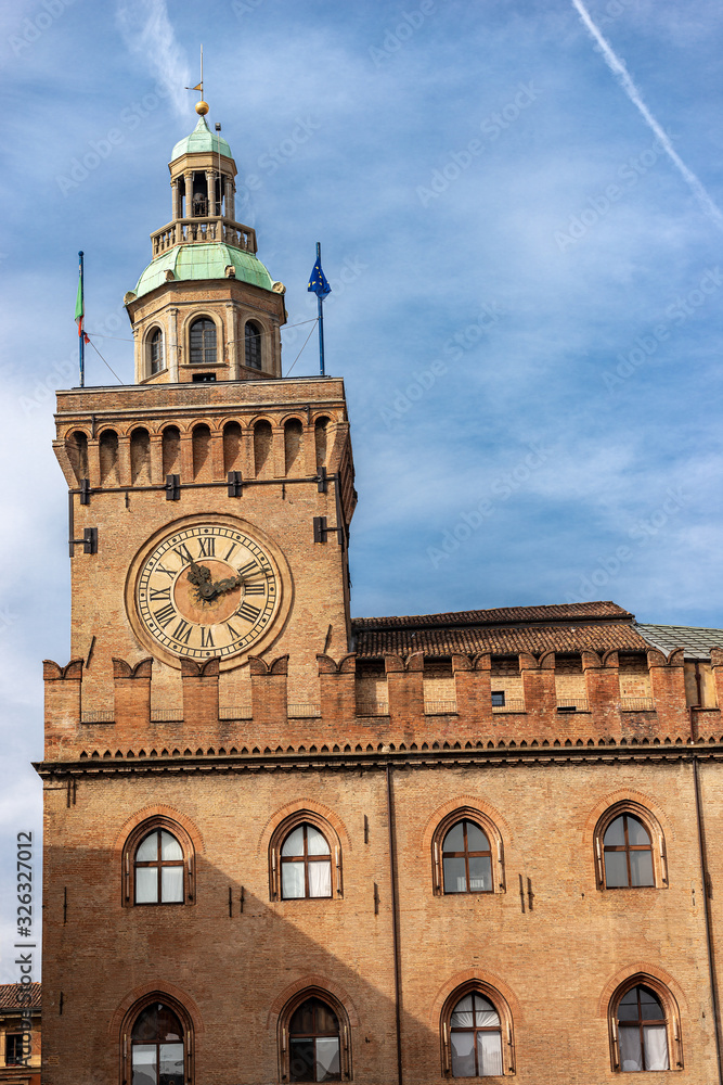 Torre degli Accursi and Palazzo d'Accursio. Clock tower and Town hall in downtown of Bologna (XIII century), Piazza Maggiore, Emilia-Romagna, Italy, Europe