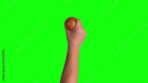Man hand stamping on chroma key green screen background