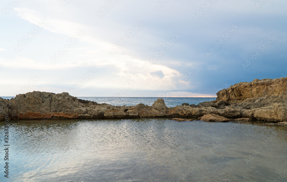 Beautiful lava stones on the Cyprus seashore.