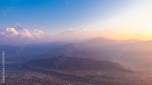 Himalaya Range During Sunrise. First Rays Of Sun Hitting The Himalayas