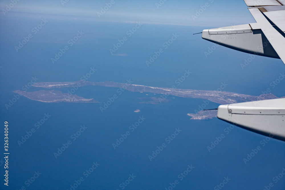 Panoramic view of the Greek islands, Cyclades from the window of an airliner. Panoramic view of the Greek islands, Cyclades from the window of an airliner.