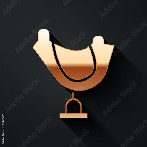 Gold Wild west saddle icon isolated on black background. Long shadow style. Vector Illustration