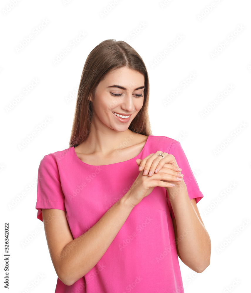 Happy young woman wearing beautiful engagement ring on white background Happy young woman wearing beautiful engagement ring on white background