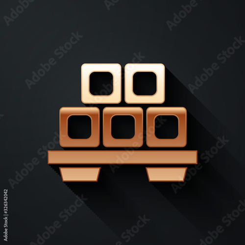 Gold Sushi on cutting board icon isolated on black background. Asian food sushi on wooden board. Long shadow style. Vector Illustration