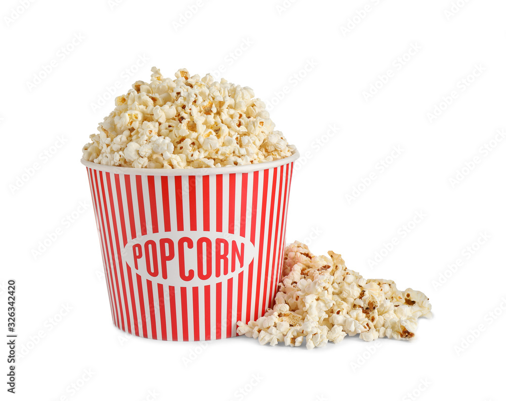 Delicious popcorn in paper bucket isolated on white Delicious popcorn in paper bucket isolated on white