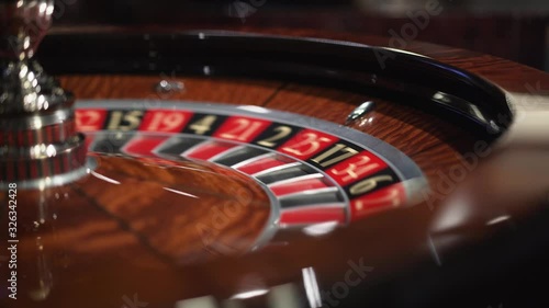 Roulette in the casino spins and white ball