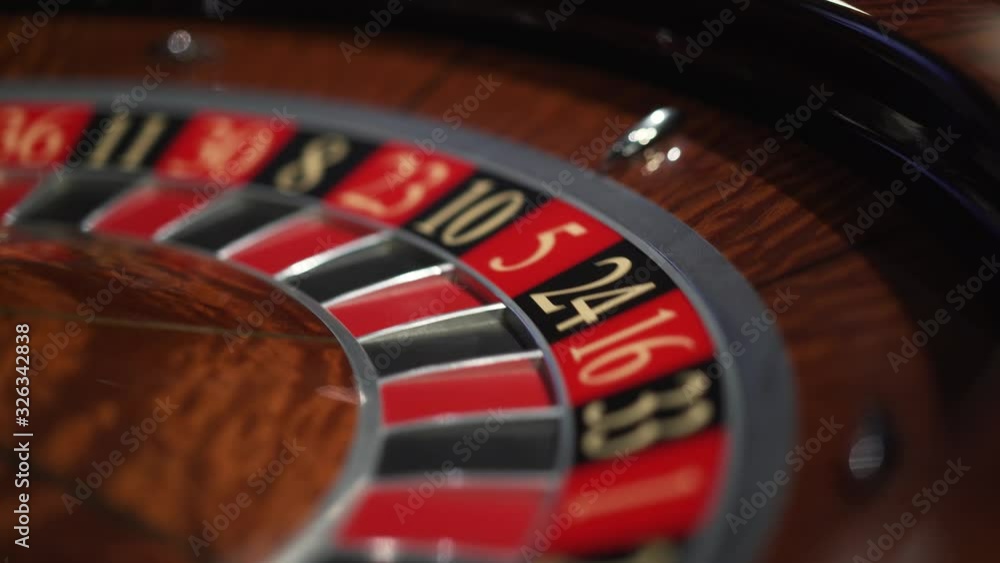Roulette in the casino spins and white ball Roulette in the casino spins and white ball