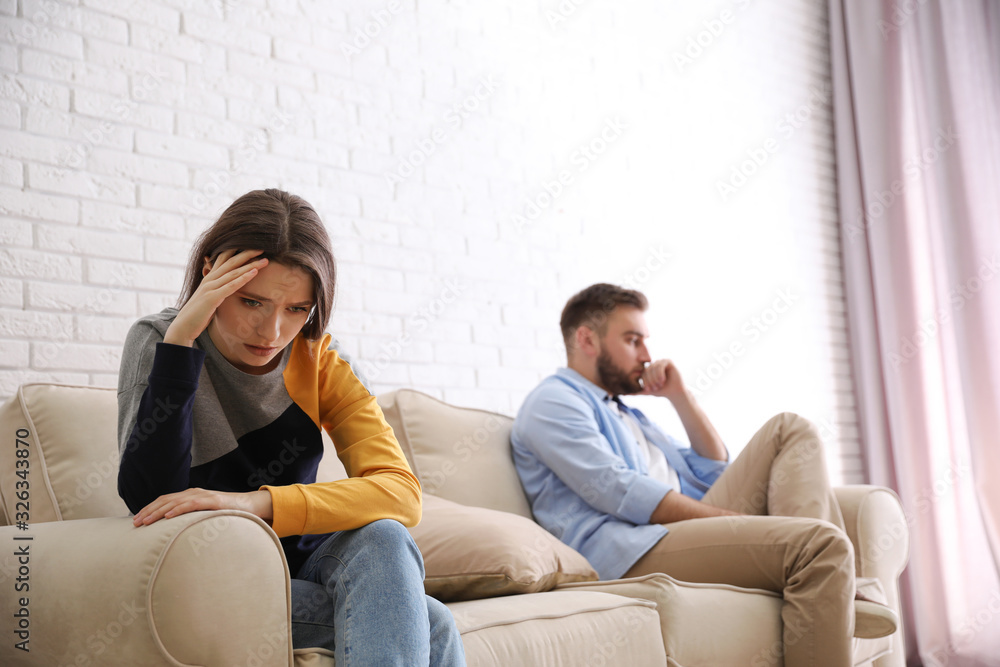 Unhappy couple with problems in relationship at home