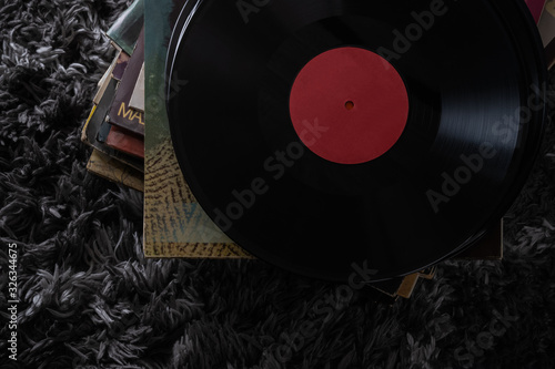 Beautiful vinyl records in a dark key very beautiful vintage artwork headphones for listening to music on records the old