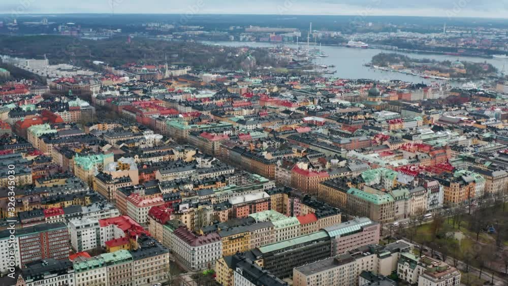 Drone flies forwards over buildings in Ostermalm, Stockholm. Aerial view of residential area, Sweden. Drone flies forwards over buildings in Ostermalm, Stockholm. Aerial view of residential area, Sweden.