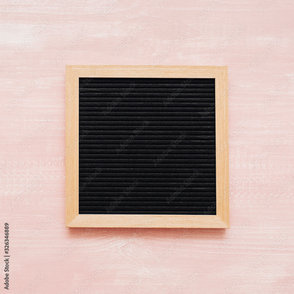 blackboard on pink wooden background blackboard on pink wooden background