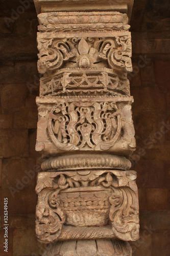 Hand carved columns in mughal temple, Qutub Minar, Delhi, India