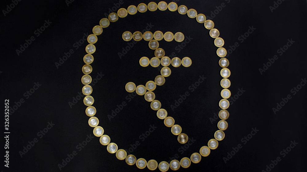 Coin art made in the international symbol of rupee with ten rupee coins