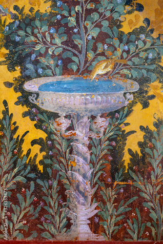 Oplontis Villa of Poppea - On the walls are represented, on a yellow and red background, gardens with beautiful fountains,
