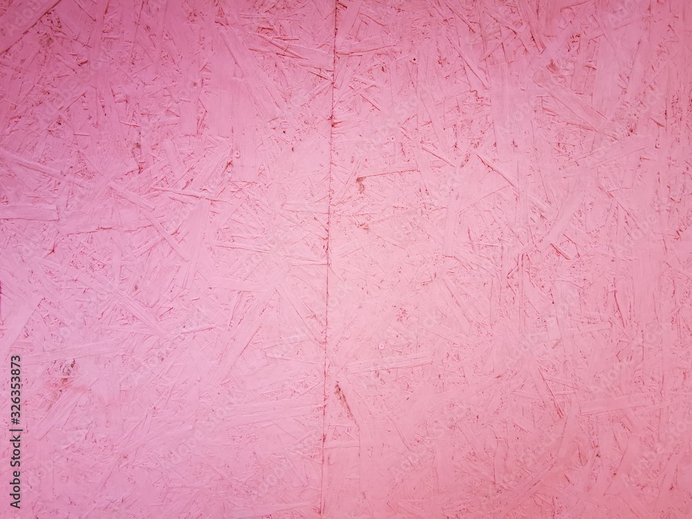 Pink plywood texture during the construction of a residential building in Russia. Eco-friendly materials. Pink plywood texture during the construction of a residential building in Russia. Eco-friendly materials.