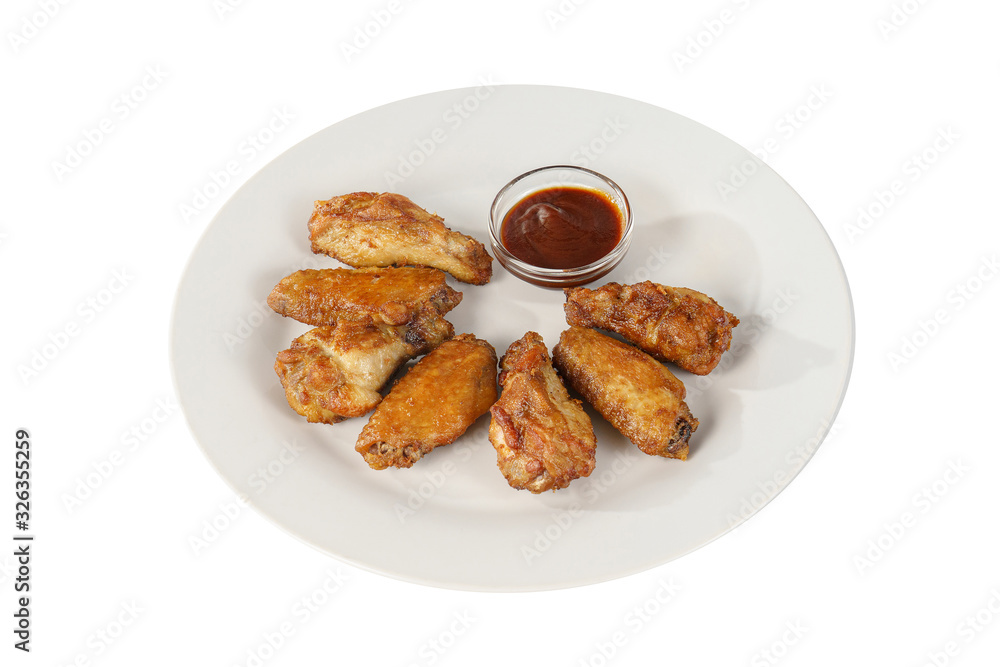 Hot appetizer chicken pieces, legs, wings, fried in oil, tomato sauce, ketchup, B-B-Q, before alcohol, on plate, white isolated background, Side view. For the menu, restaurant, bar cafe Hot appetizer chicken pieces, legs, wings, fried in oil, tomato sauce, ketchup, B-B-Q, before alcohol, on plate, white isolated background, Side view. For the menu, restaurant, bar cafe