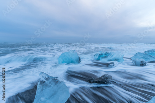 Diamond beach with huge ice glaciers in winter in Iceland © Sen