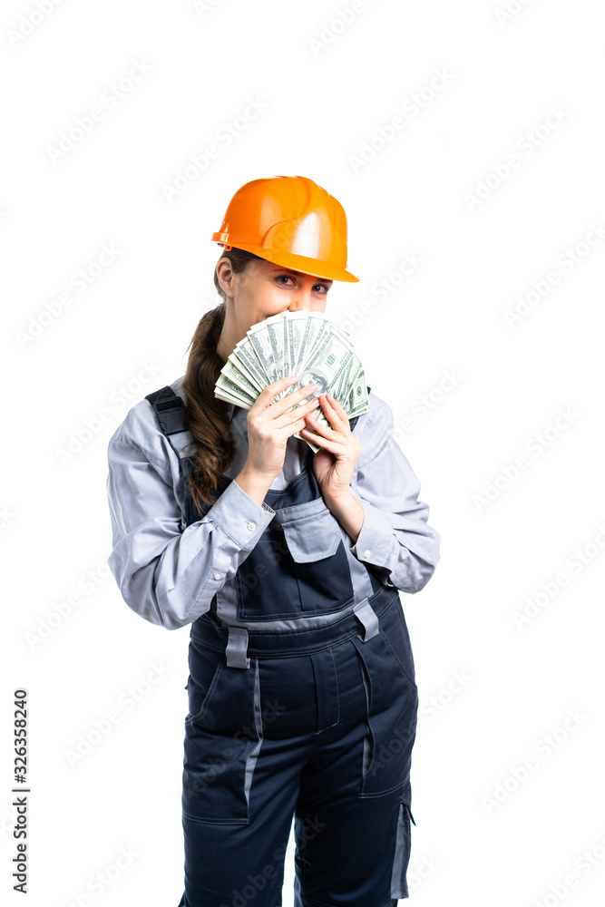 The female civil engineer made a very good deal and was very happy. A huge pile of money for a salary in dollars. isolated The female civil engineer made a very good deal and was very happy. A huge pile of money for a salary in dollars. isolated